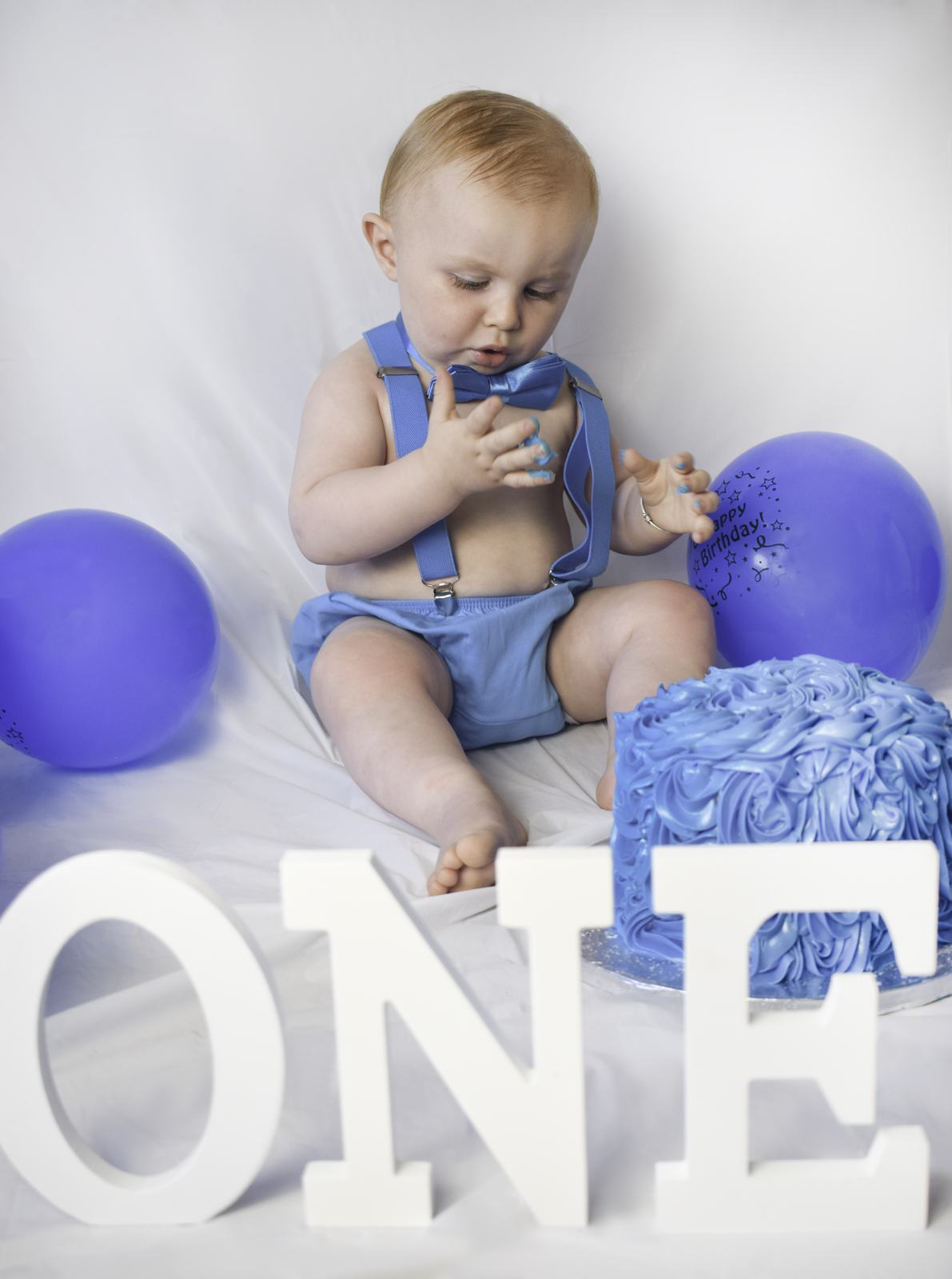 Layden’s first birthday cake smash — frame 9